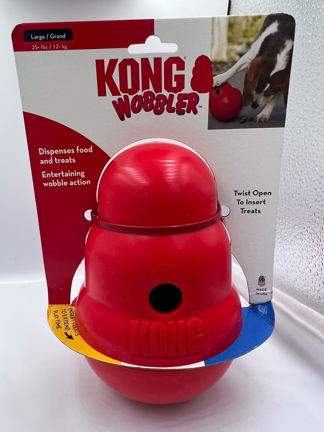 Kong Wobbler:  A Toy and Treat / Food Dispenser